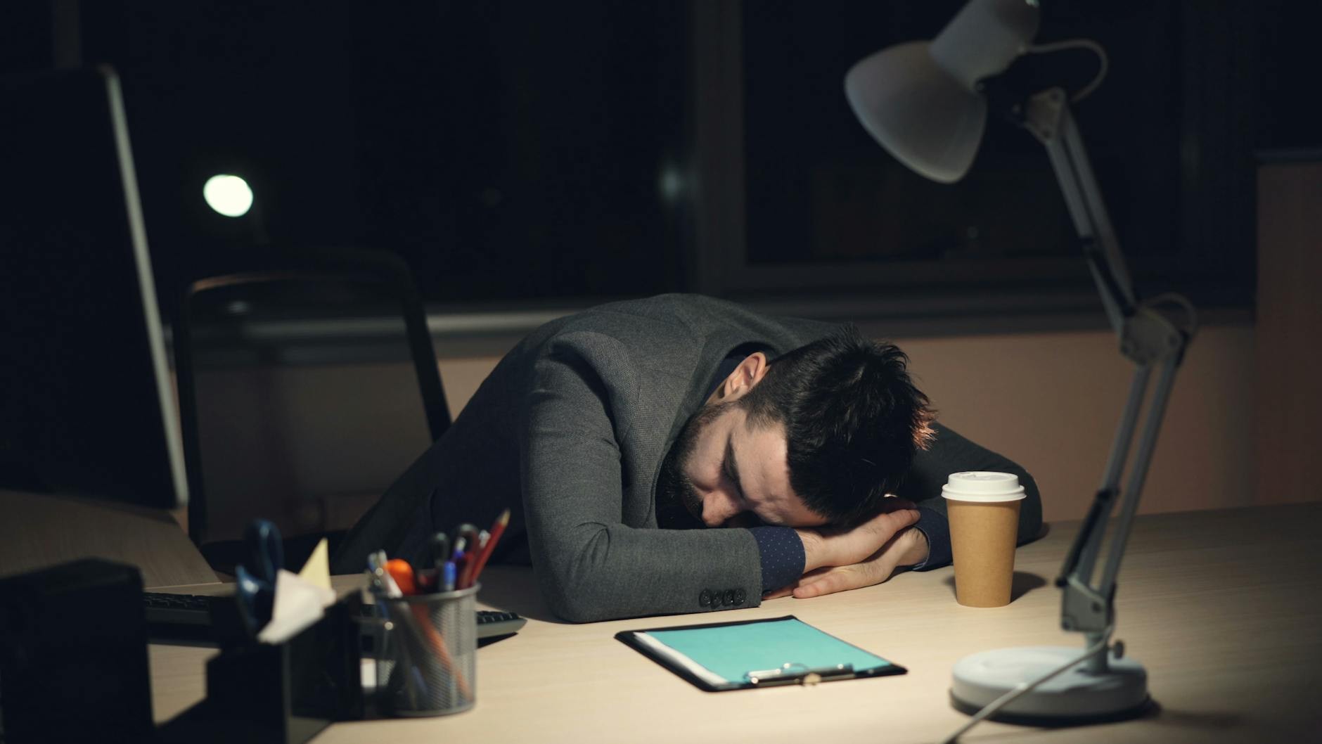 Shift worker sleeping in a dimly lit bedroom